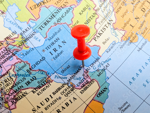 Red pushpin marking the Strait of Hormuz on map