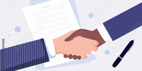 A business deal is sealed with a handshake over a document