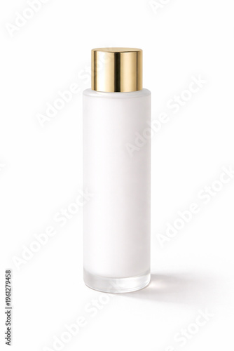 Elegance in a Bottle: A sleek, frosted glass bottle with a luxurious gold cap stands poised against a minimalist backdrop, exuding an aura of sophistication and purity. 