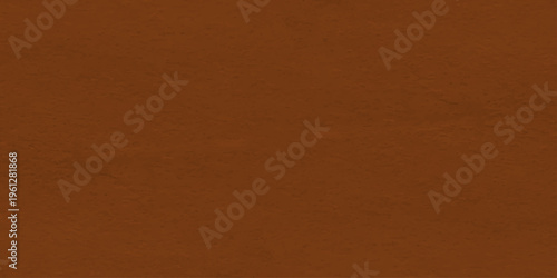 Brown textured paper background with warm earthy tones, rustic mahogany wood grain surface for creative design backdrop