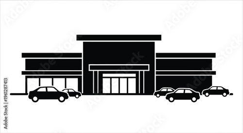 Modern building facade with parked cars in a striking silhouette