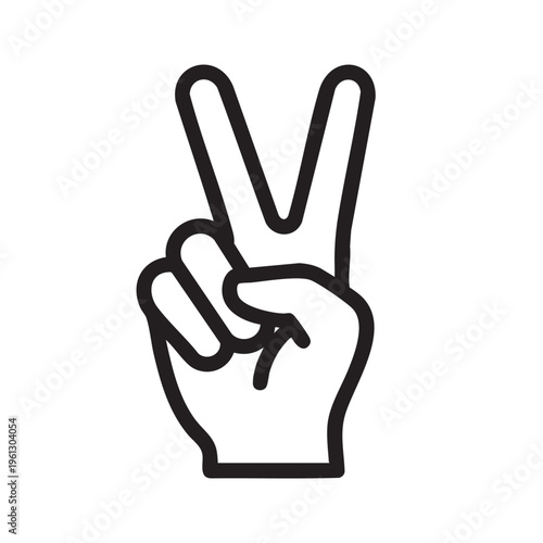 A hand shows peace sign in a symbolic gesture of love and harmony.