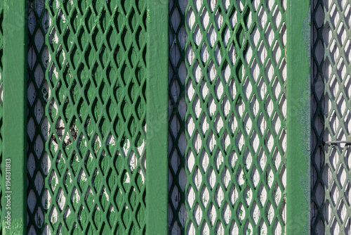 green metal fence