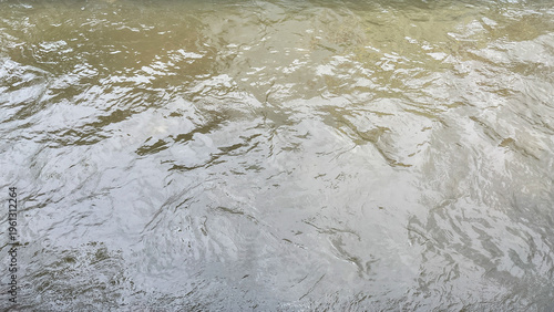 Rippling Surface of Murky and Turbid River Water