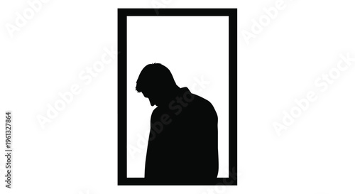 A solitary man viewed through a rectangular frame a striking silhouette
