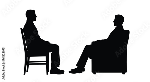 Two men in suits sit facing each other in chairs silhouette