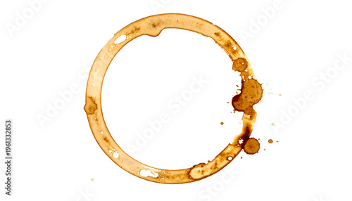 A ring-shaped stain with droplets around it, a coffee or tea spill against black