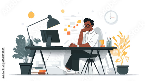 Young african male professional working at desk in modern office setting