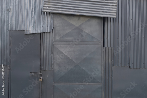 Wallpaper Mural warehouse shed door and wall with pieces of corrugated aluminum sheet metal Torontodigital.ca