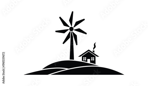 Silhouette of a house and wind turbine on a hill