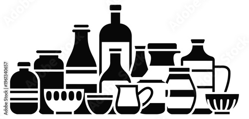 Assortment of bottles and jars representing pantry staples, condiments, and food storage for kitchen and grocery