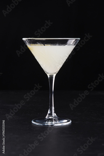 Alcoholic cocktail on a black background