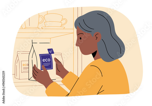 A mature woman examines eco-labeled coffee bags in a kitchen cabinet. Warm tones and a focus on sustainable products create a comforting, mindful scene.