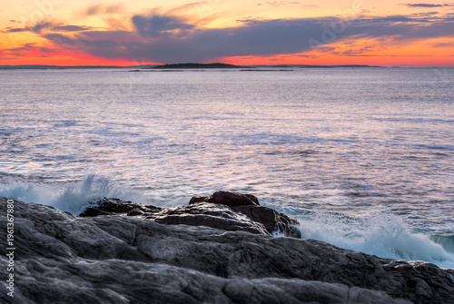 Waves Crash Against Maine Coastline at Sunrise