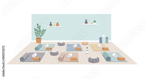 A tranquil yoga studio is set up with multiple mats, towels, blocks, and cushions on a wooden floor against a light blue wall.