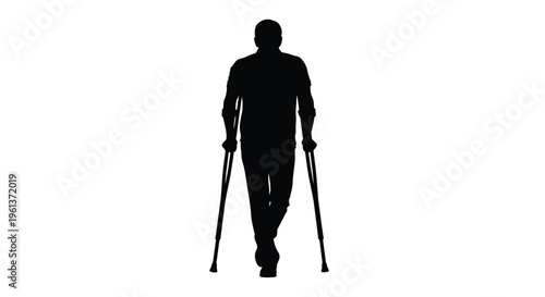 A man walking with crutches a stark black silhouette