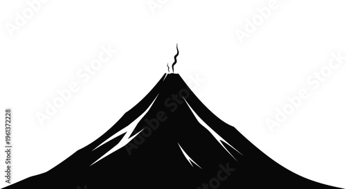 Dramatic volcanic mountain landscape with rising smoke a striking silhouette
