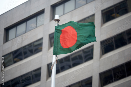 Принти на полотні The Bangladeshi flag on a flag pole at Toronto City Hall’s Nathan Phillips Square