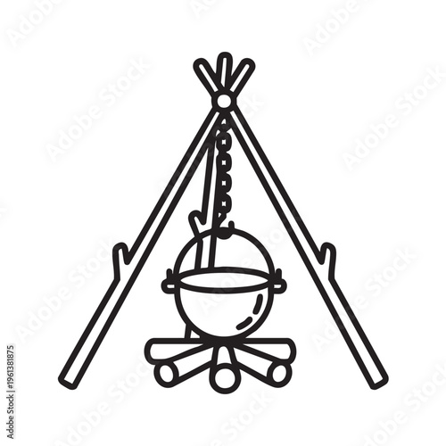 Camping tripod pot hangs over campfire for outdoor cooking at night