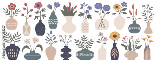 Assorted floral arrangements in decorative vases flower