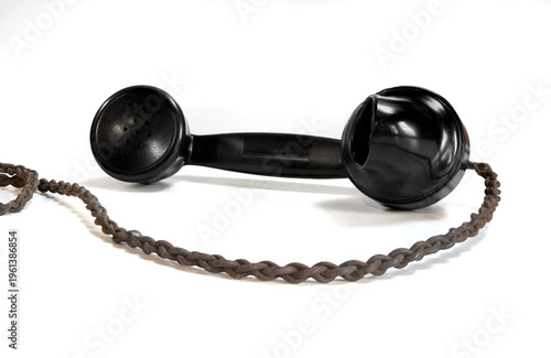 Photos Vintage telephone handset with cord isolated on white background