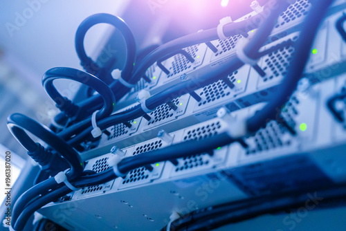 Close-Up of Server Rack with Power Cables and Indicator Lights