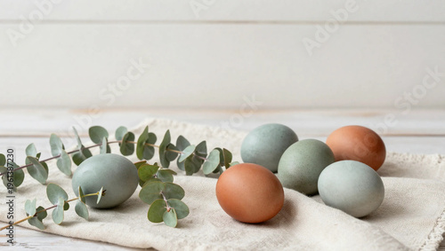 Minimal Easter Composition with Natural Dyed Eggs, Linen, and Eucalyptus