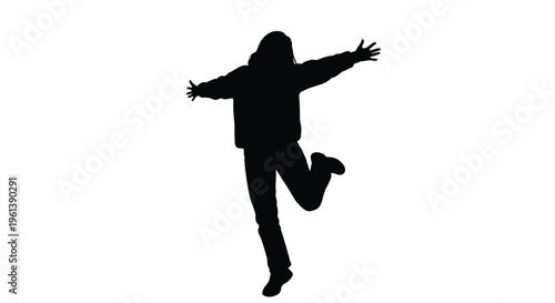 Joyful person jumping with arms outstretched a striking silhouette