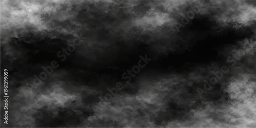 A moody black and white smoke texture swirls like a dark stormy cloudscape against a night sky backdrop to create a dramatic nature motion background