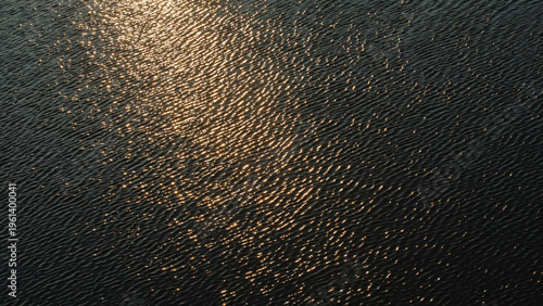 Fotografie Glittering River Water Waves at Sunset.
