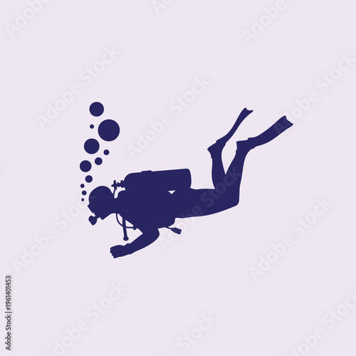 silhouette of a man scuba diver