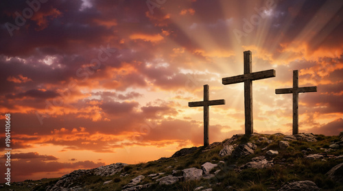 Three wooden crosses on a rocky hill at sunset. Golgotha calvary scene with dramatic sun rays. Christian religion and Easter crucifixion concept