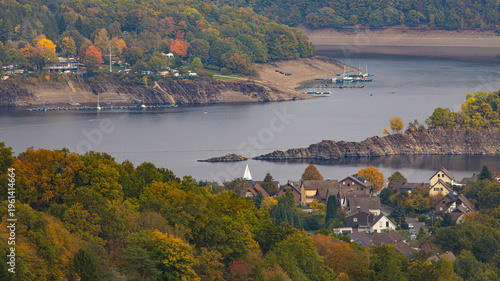 autumn landscape with lake and mountains