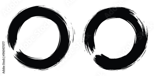 A pair of black brushstroke zeros on a white background