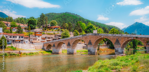 Bild auf Leinwand Old Stone Bridge (Stara Cuprija) over the Neretva River in Konjic, a masterpiece of Ottoman architecture, Bosnia and Herzegovina