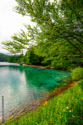 Lake of Fusine or Lago Superiore di Fusine in the Mountain Range of Mount Mangart in Julian Alps near Tarvisio in Italy near Slovenia