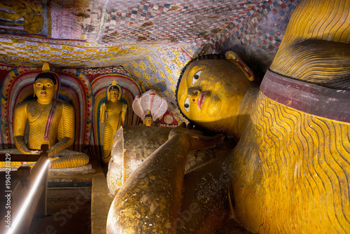 Buddha statues and murals inside Dambulla Cave Temple in Sri Lanka capture rich cultural history and artistry