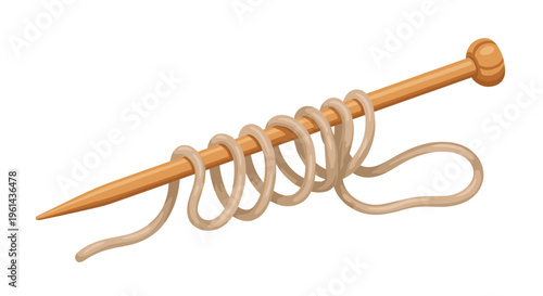 A single light brown wooden knitting needle with beige yarn loops is shown horizontally against a white background.