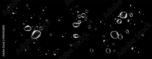 Abstract transparent soap bubbles and water drops on dark background. Underwater oxygen bubble texture.