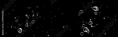 Transparent soap bubbles and water drops on dark background. Fizzy underwater oxygen texture.