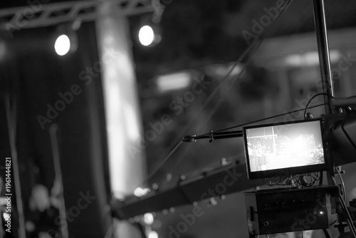 Professional cinema camera crane with large copy space on black background, film production concept