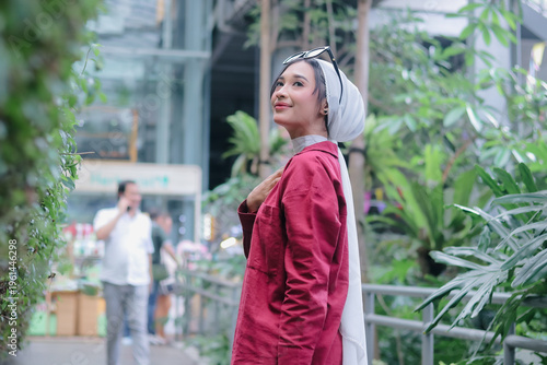 Serene Portrait of a Young Woman in Hijab, Reflecting on the Fut