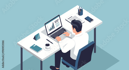 Productive man working on laptop with charts and graphs on screen, seen from an overhead perspective in a modern office studio.