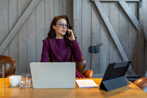 Woman therapist guiding client. Female life guide consulting online. Modern workspace scene with woman promoting goal achievement and personal growth through digital devices