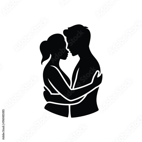 Silhouetted couple embracing in a tender and intimate moment