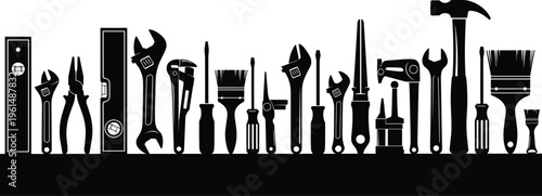 Black silhouette of hand tools collection including hammer wrench screwdriver pliers and spirit level isolated on white background for repair and construction