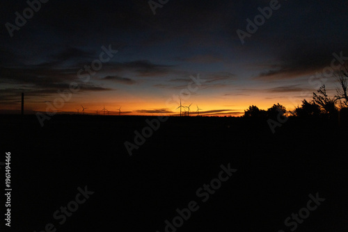 wind farm at sunset 