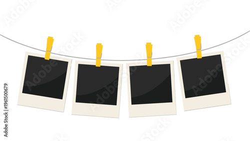 Four blank instant photo frames hang from a thin wire with yellow clothespins against a clean white background.