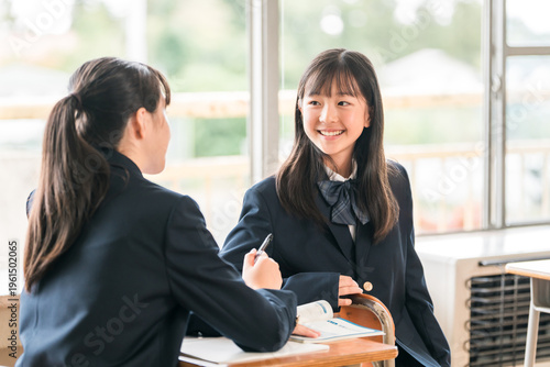 Fotografía Elementary, middle, and high school students talking with friends, classmates, and peers in the classroom during recess