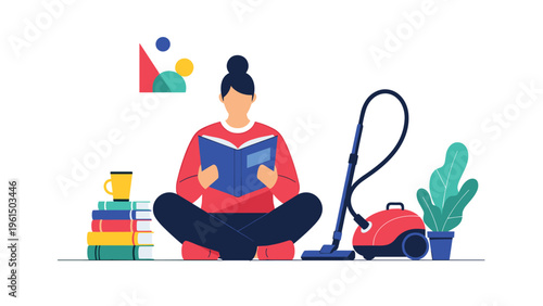 Young woman sitting cross legged on the floor reading a book with a red vacuum cleaner and a stack of books nearby in a modern setting.